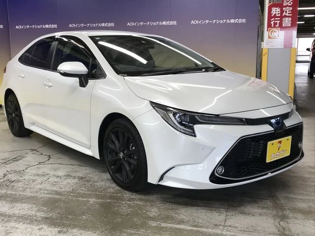 Toyota COROLLA sedan HYBRID 4WD W×B　50ミリオンエディション photo 2