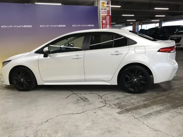 Toyota COROLLA sedan HYBRID 4WD W×B　50ミリオンエディション photo 3