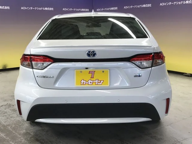 Toyota COROLLA sedan HYBRID 4WD W×B　50ミリオンエディション photo 4